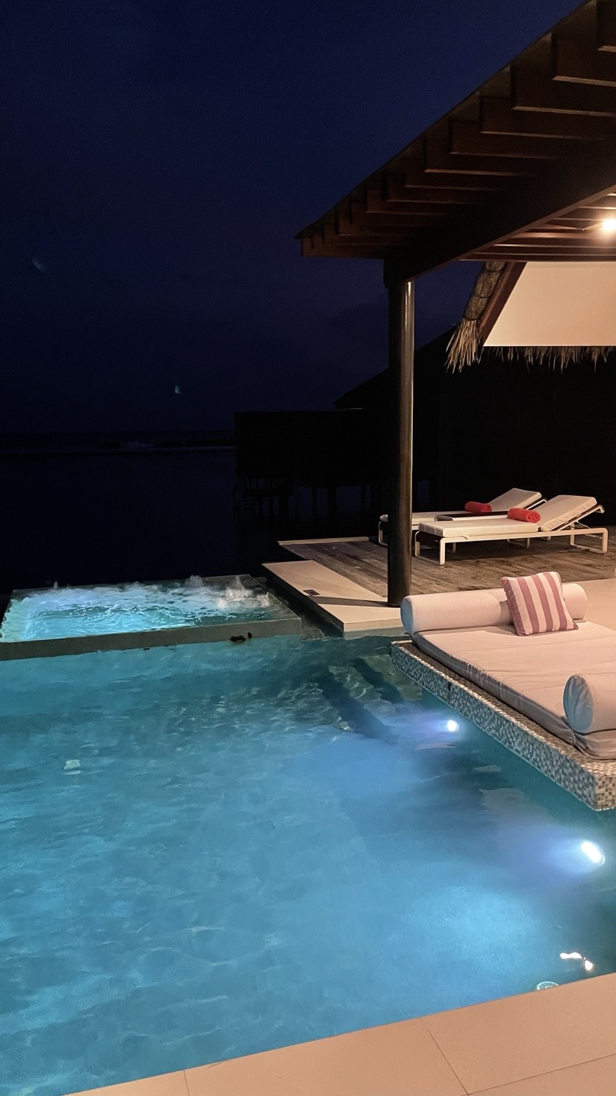Night luxury-villa pool scene